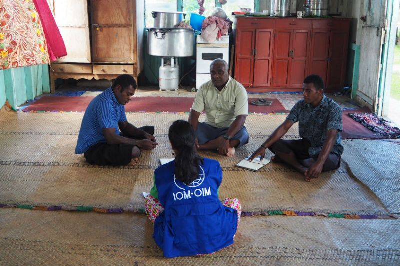 IOM Programme Associate for Migration, Sabira Coelho, conducts a focus group with three members of the community in Daku.