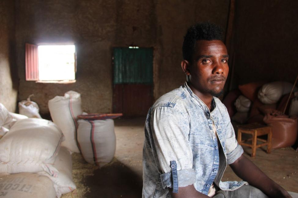 Maru inside his EUTF-sponsored grain trading store in southern Ethiopia. Photo: Uduak Amimo/IOM 2018