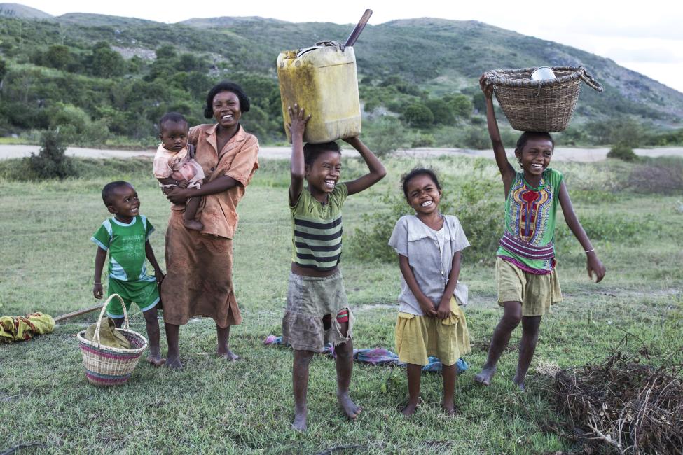 In many parts of Madagascar, children go to school because they receive food there but after school, they spend the rest of the day fetching water. Photo: IOM / Natalie Oren 2017