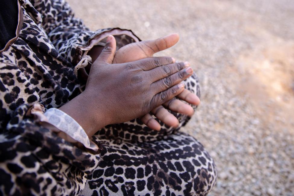 A Nigerian woman in a Libyan detention centre speaks about her journey, most of which was on foot, and her hope for the future. IOM is working to secure alternatives to detention for migrants. Photo: Olivia Headon/IOM 2018